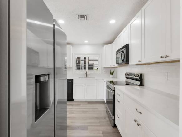 Spacious 3-Bedroom + Loft Townhouse with Water Views in Parkland