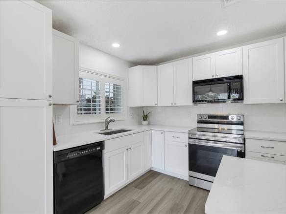 Spacious 3-Bedroom + Loft Townhouse with Water Views in Parkland