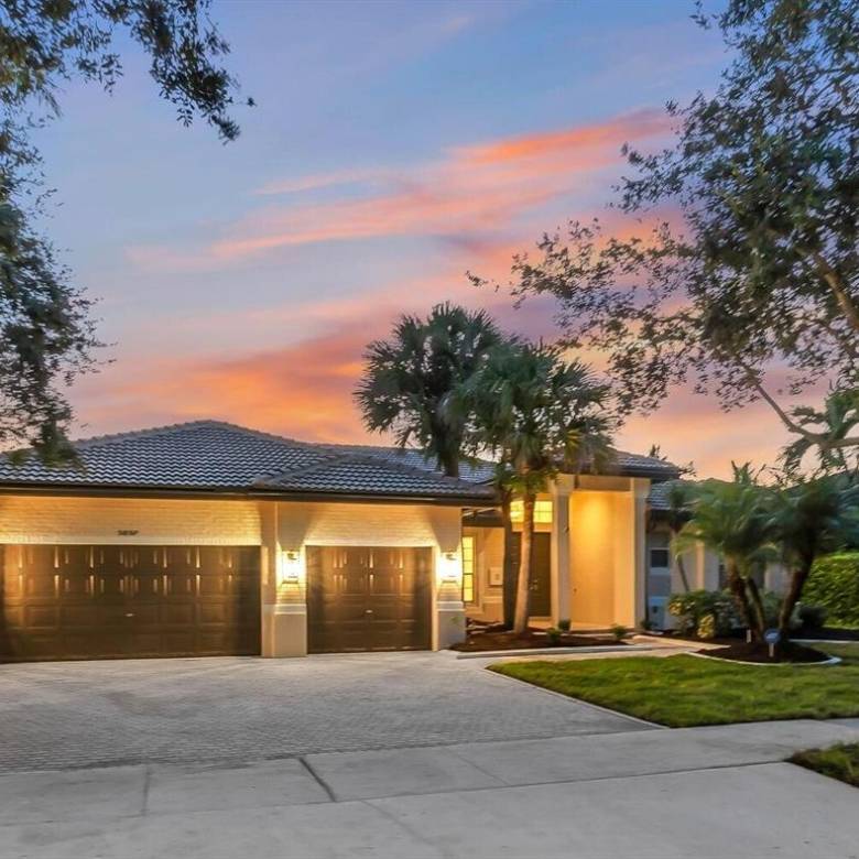 Stunning Lakefront Residence with Sunset Views in Cooper City