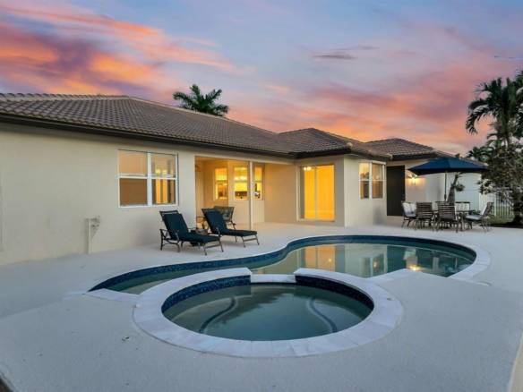 Stunning Lakefront Residence with Sunset Views in Cooper City
