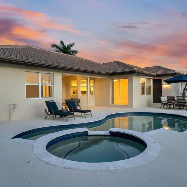 Stunning Lakefront Residence with Sunset Views in Cooper City