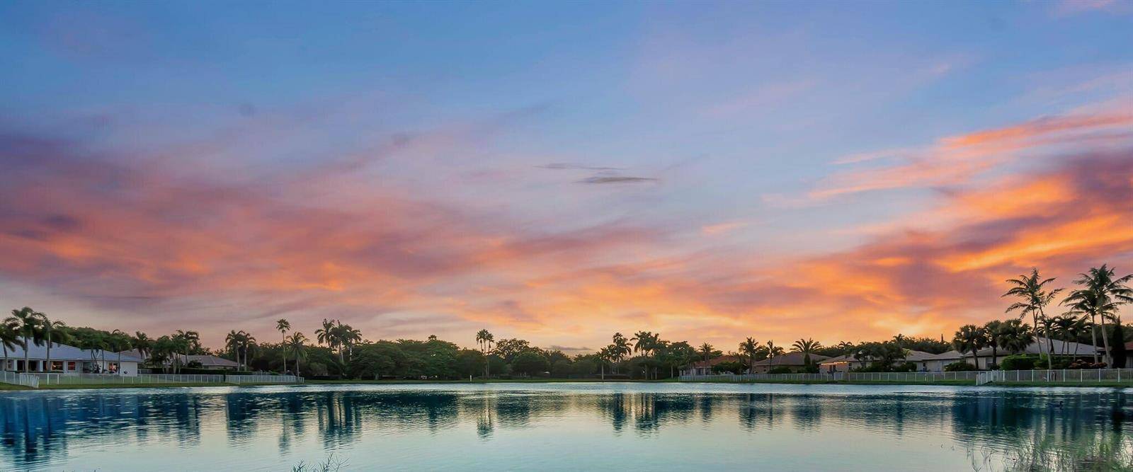 13 Stunning Lakefront Residence with Sunset Views in Cooper City