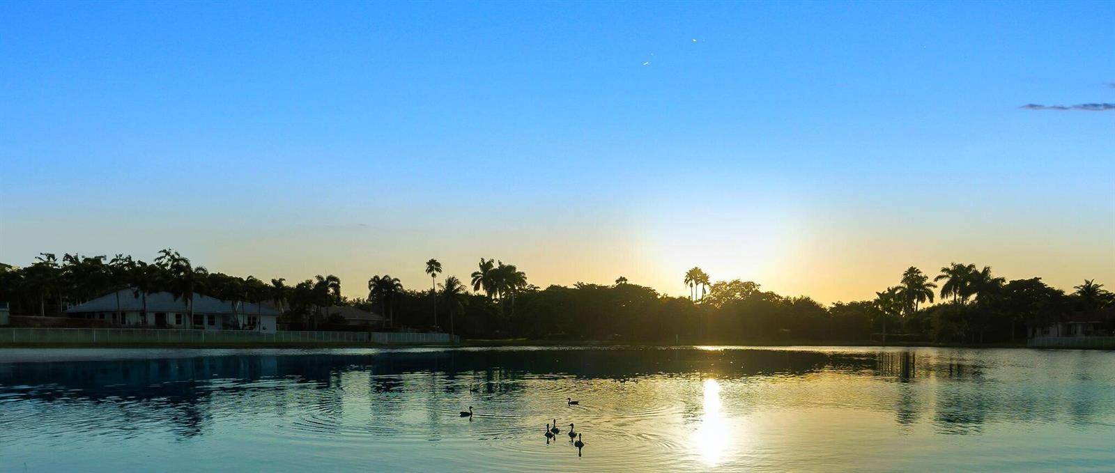 14 Stunning Lakefront Residence with Sunset Views in Cooper City