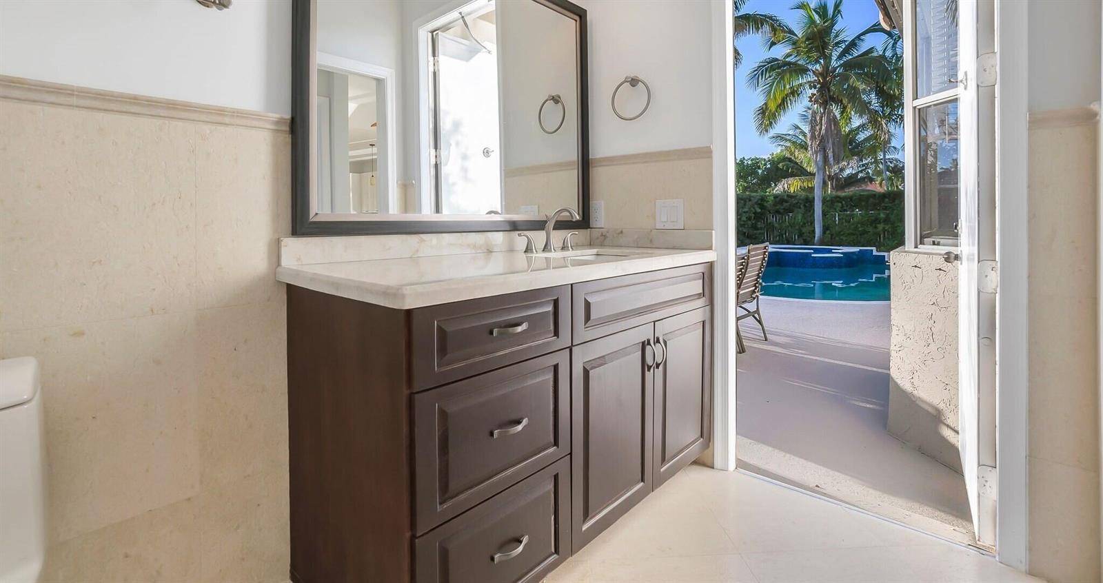 15 Stunning Lakefront Residence with Sunset Views in Cooper City