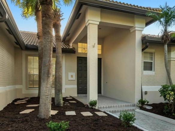 Stunning Lakefront Residence with Sunset Views in Cooper City