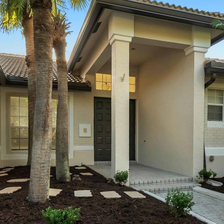 Stunning Lakefront Residence with Sunset Views in Cooper City
