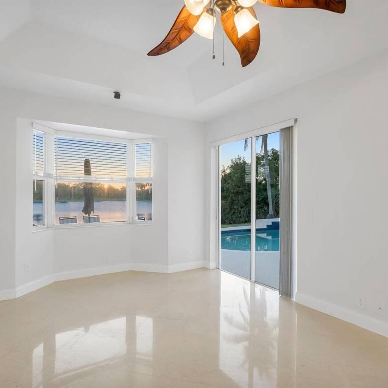 Stunning Lakefront Residence with Sunset Views in Cooper City