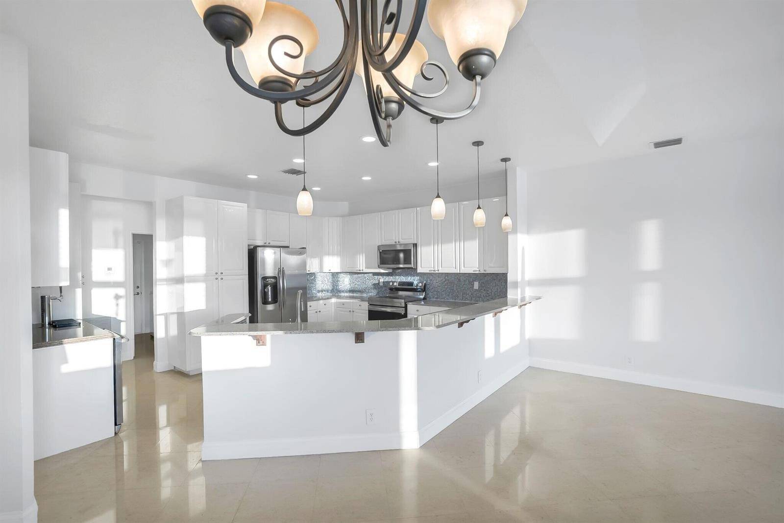24 Stunning Lakefront Residence with Sunset Views in Cooper City
