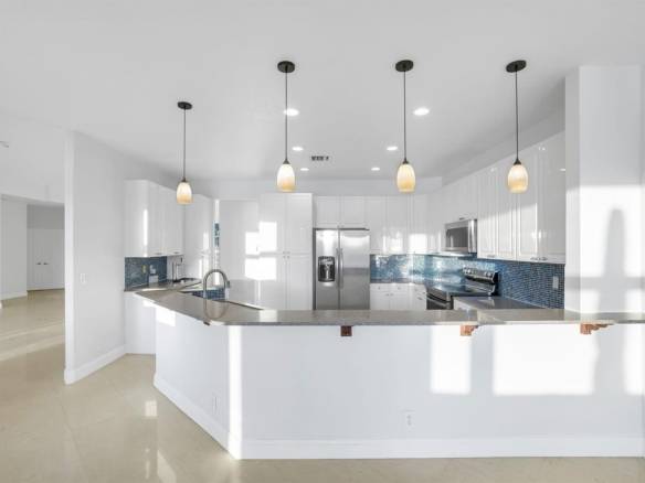 Stunning Lakefront Residence with Sunset Views in Cooper City