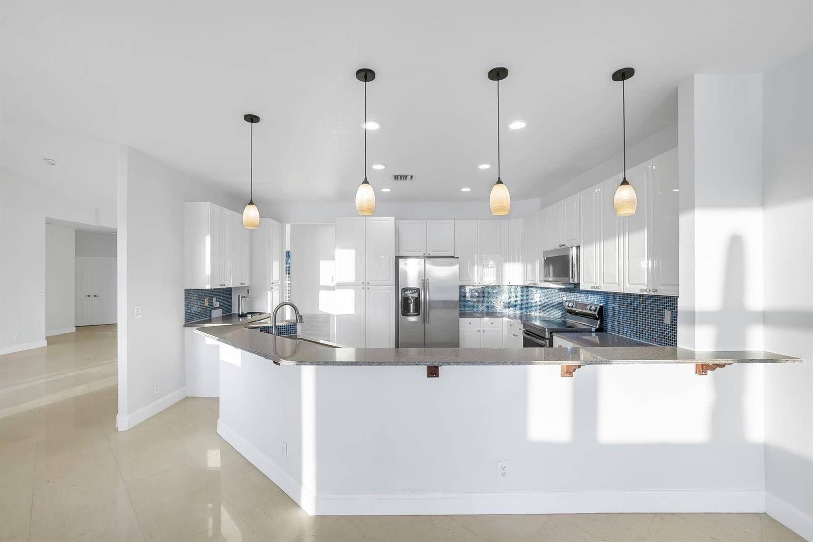 25 Stunning Lakefront Residence with Sunset Views in Cooper City