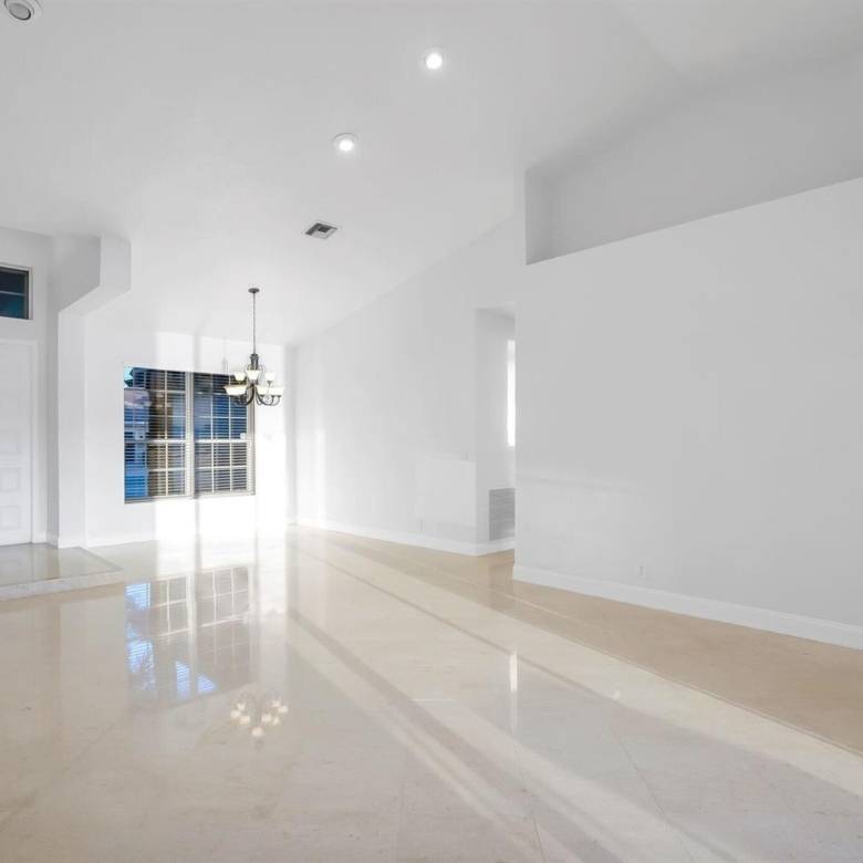 Stunning Lakefront Residence with Sunset Views in Cooper City