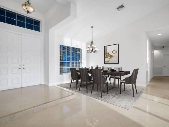 Stunning Lakefront Residence with Sunset Views in Cooper City
