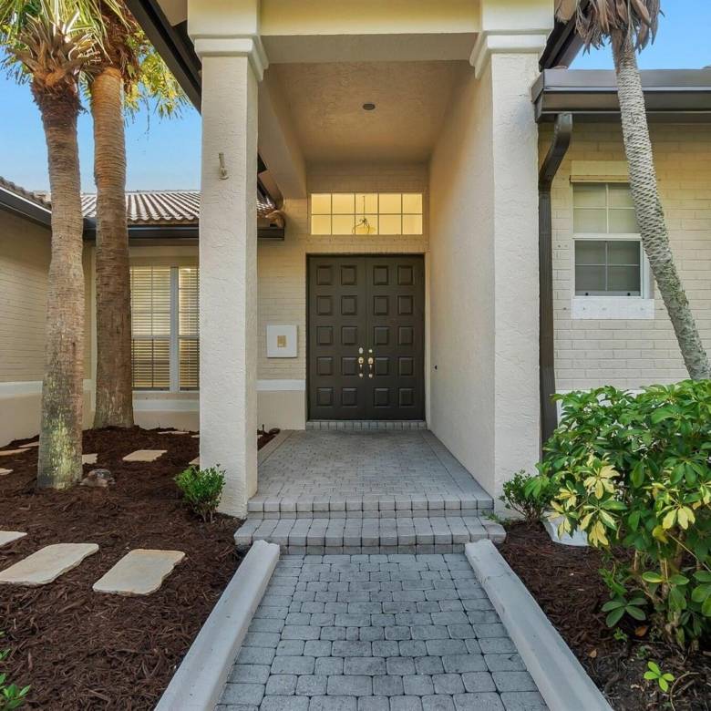 Stunning Lakefront Residence with Sunset Views in Cooper City