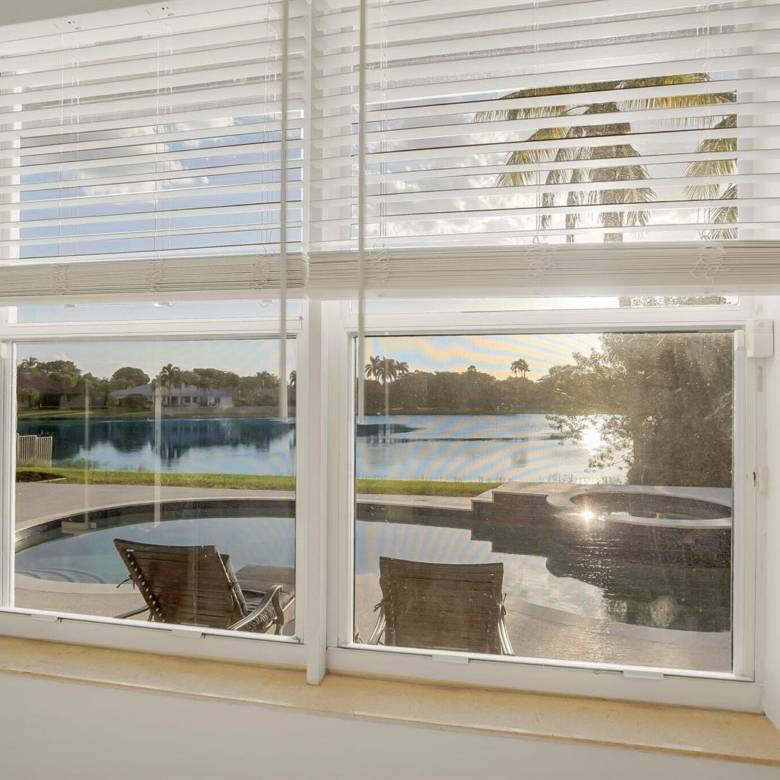 Stunning Lakefront Residence with Sunset Views in Cooper City