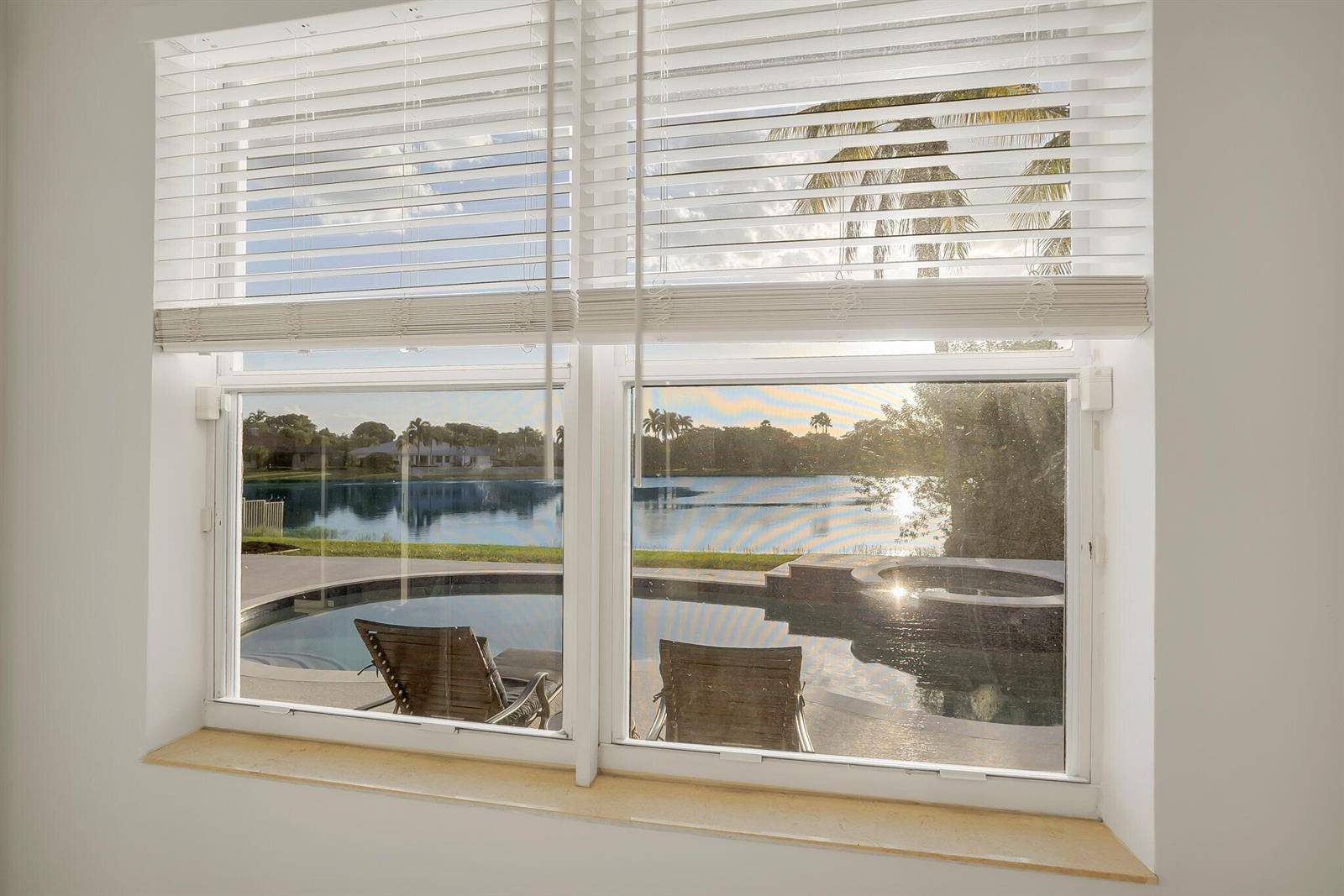 34 Stunning Lakefront Residence with Sunset Views in Cooper City