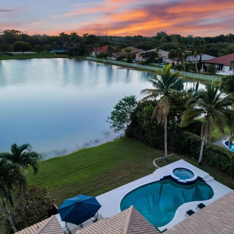 Stunning Lakefront Residence with Sunset Views in Cooper City