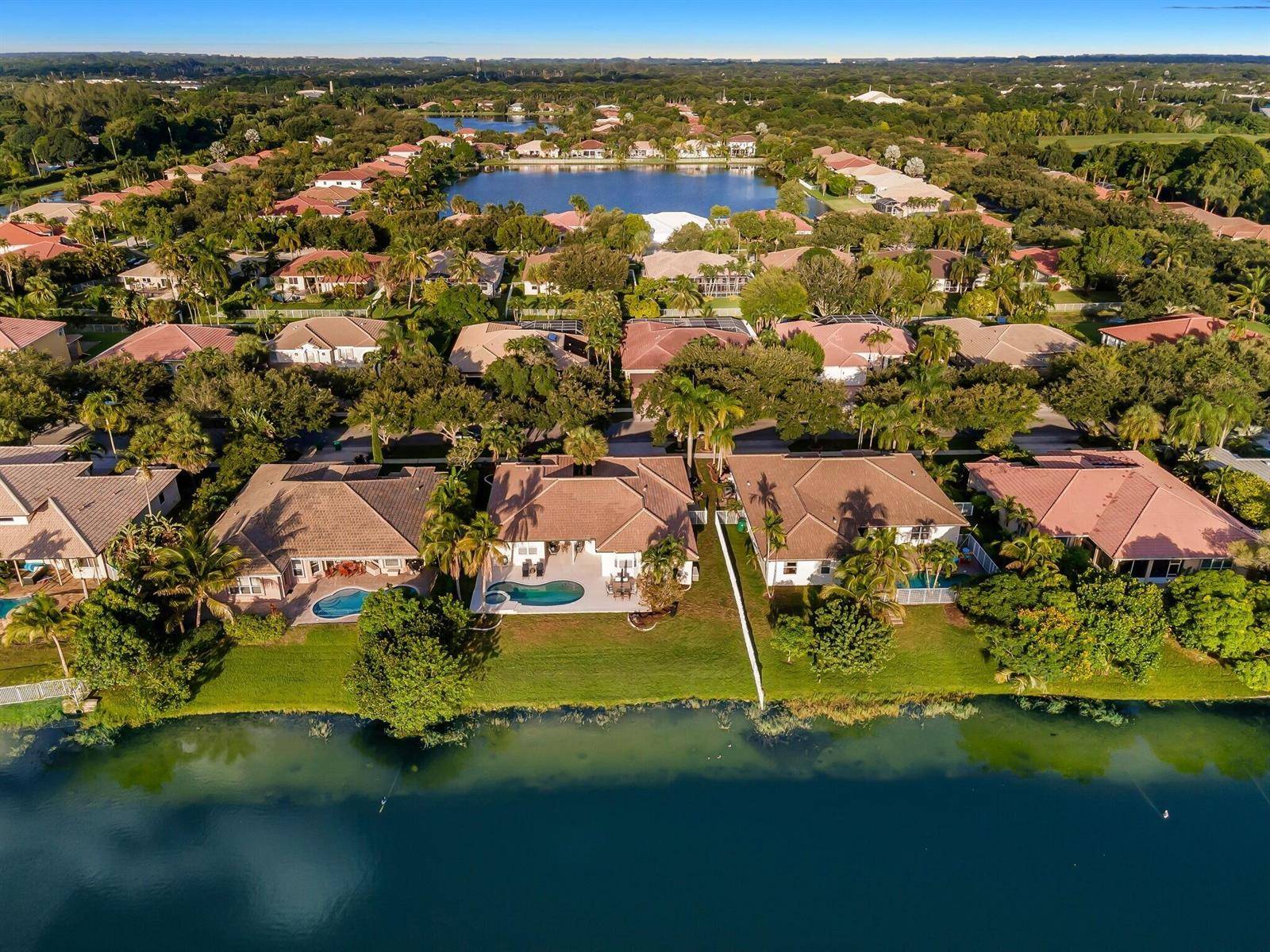 54 Stunning Lakefront Residence with Sunset Views in Cooper City