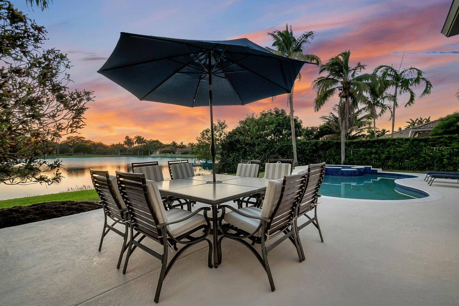 9 Stunning Lakefront Residence with Sunset Views in Cooper City