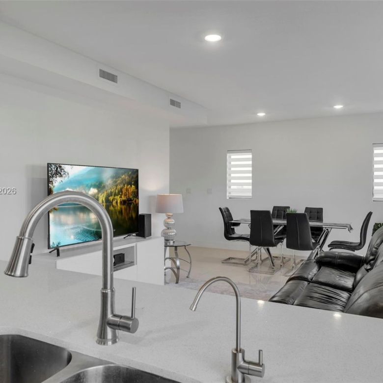 Spacious 5-Bedroom Corner-Lot Home with Three Private Suites in Aurora Subdivision