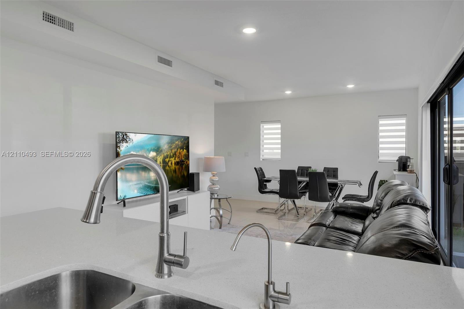 Spacious 5-Bedroom Corner-Lot Home with Three Private Suites in Aurora Subdivision