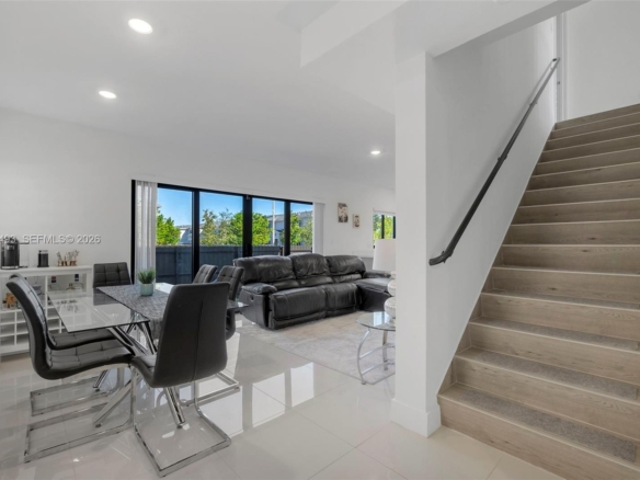 Spacious 5-Bedroom Corner-Lot Home with Three Private Suites in Aurora Subdivision