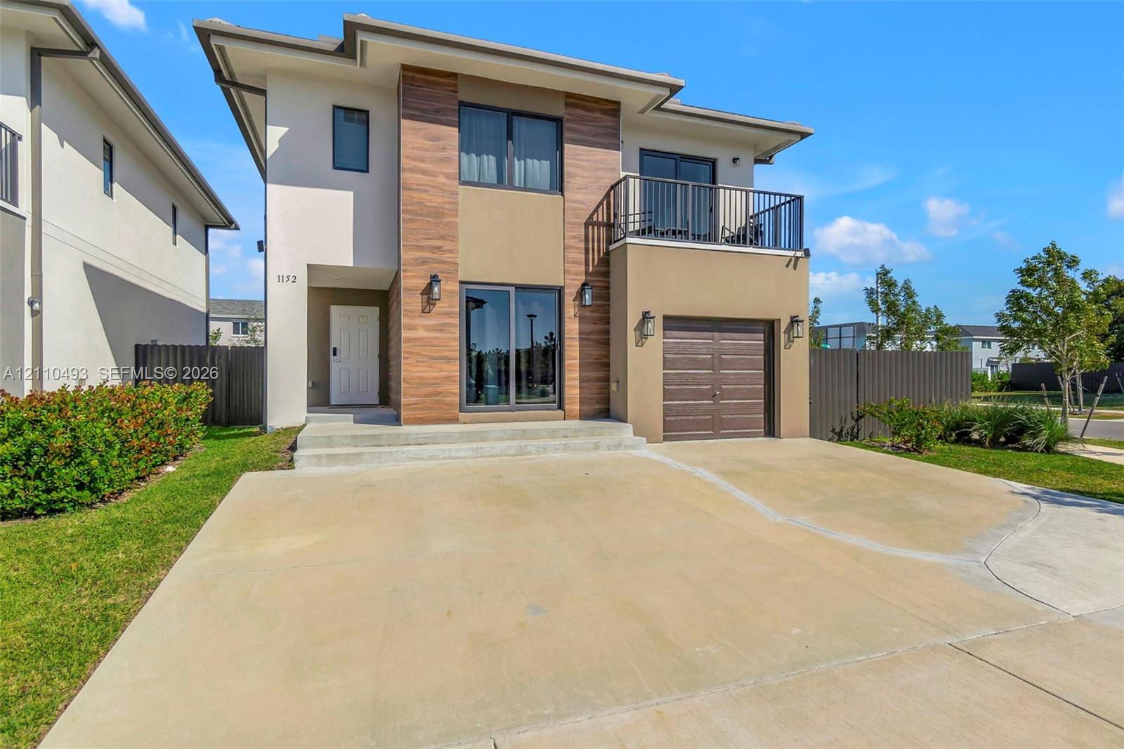 Spacious 5-Bedroom Corner-Lot Home with Three Private Suites in Aurora Subdivision
