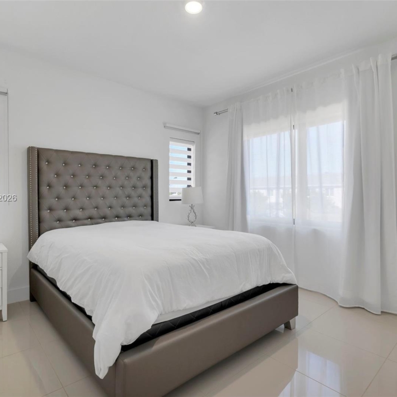 Spacious 5-Bedroom Corner-Lot Home with Three Private Suites in Aurora Subdivision