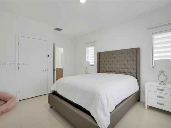 Spacious 5-Bedroom Corner-Lot Home with Three Private Suites in Aurora Subdivision