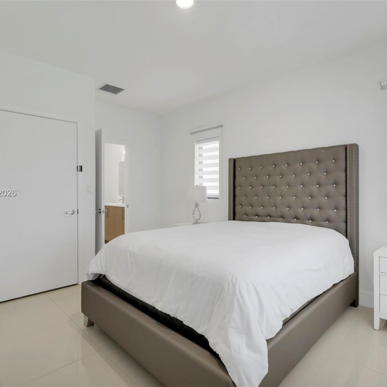 Spacious 5-Bedroom Corner-Lot Home with Three Private Suites in Aurora Subdivision