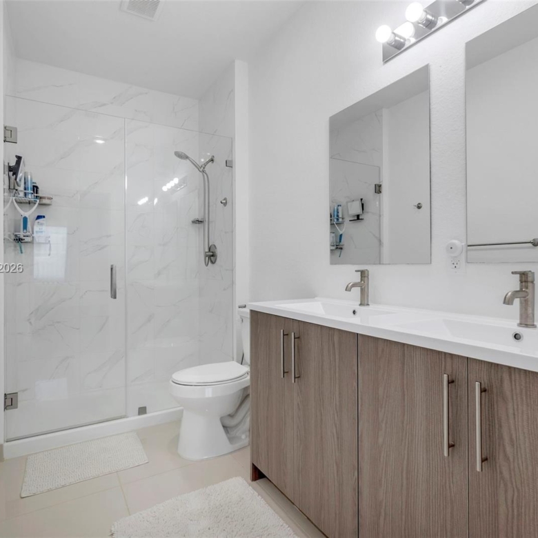 Spacious 5-Bedroom Corner-Lot Home with Three Private Suites in Aurora Subdivision