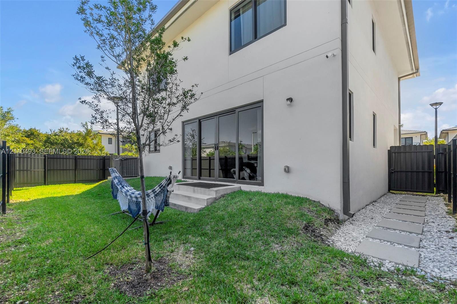 Spacious 5-Bedroom Corner-Lot Home with Three Private Suites in Aurora Subdivision