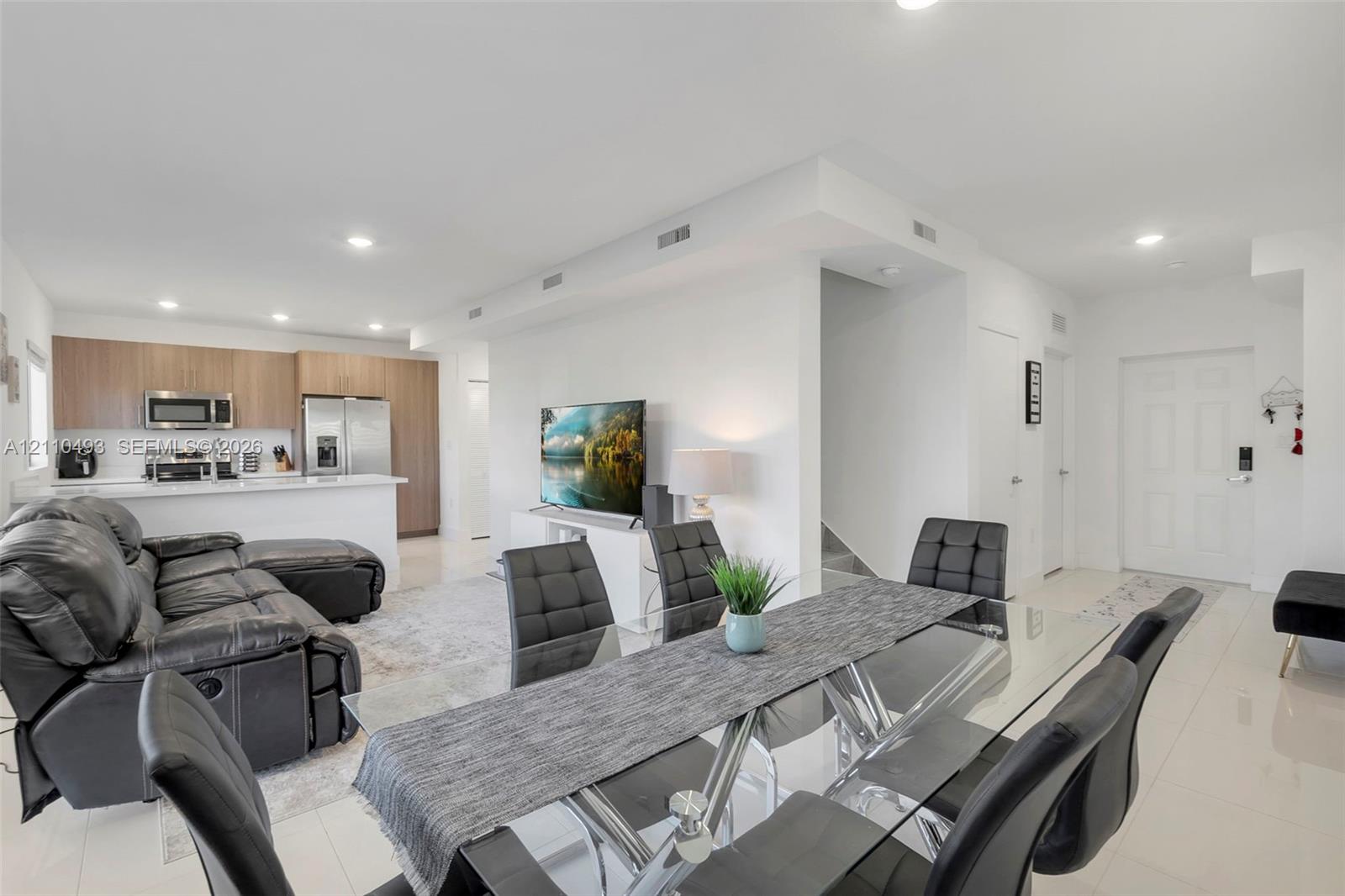 Spacious 5-Bedroom Corner-Lot Home with Three Private Suites in Aurora Subdivision