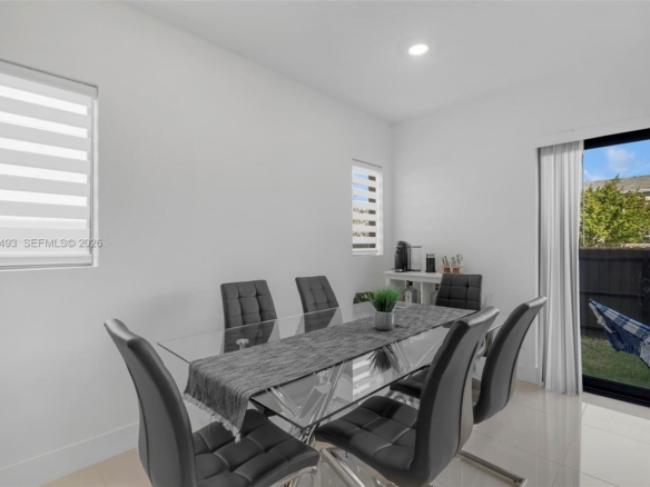 Spacious 5-Bedroom Corner-Lot Home with Three Private Suites in Aurora Subdivision