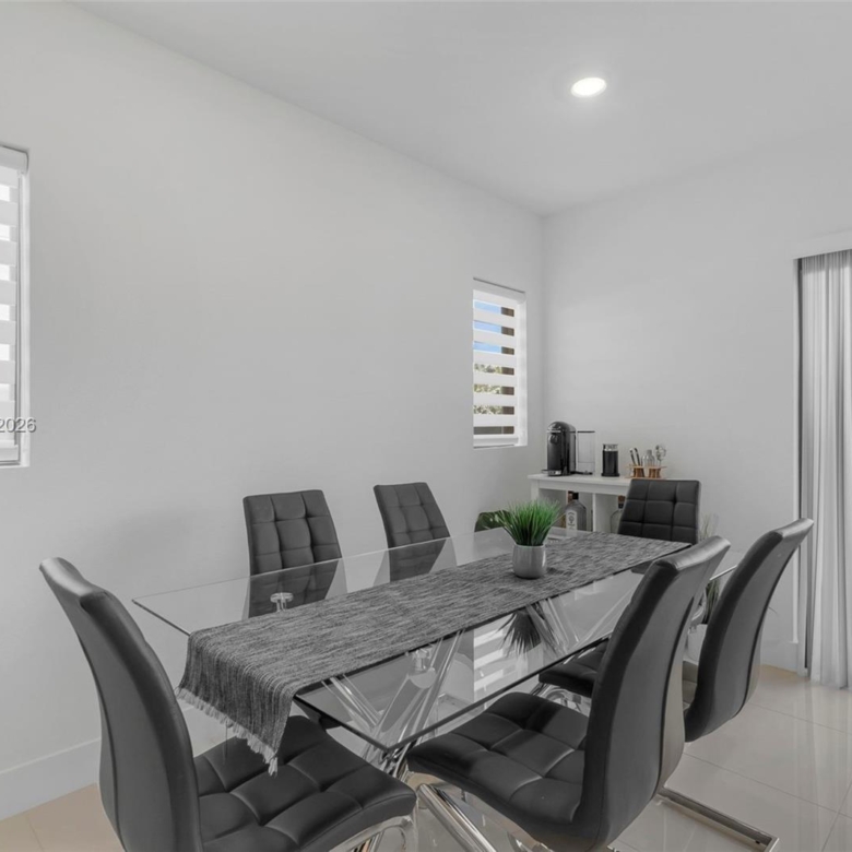 Spacious 5-Bedroom Corner-Lot Home with Three Private Suites in Aurora Subdivision
