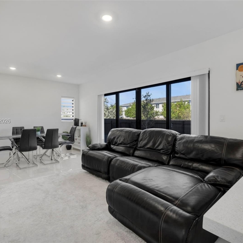 Spacious 5-Bedroom Corner-Lot Home with Three Private Suites in Aurora Subdivision