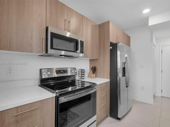 Spacious 5-Bedroom Corner-Lot Home with Three Private Suites in Aurora Subdivision
